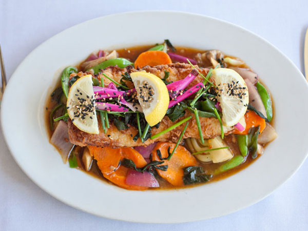 A delicious entree served with vegetables