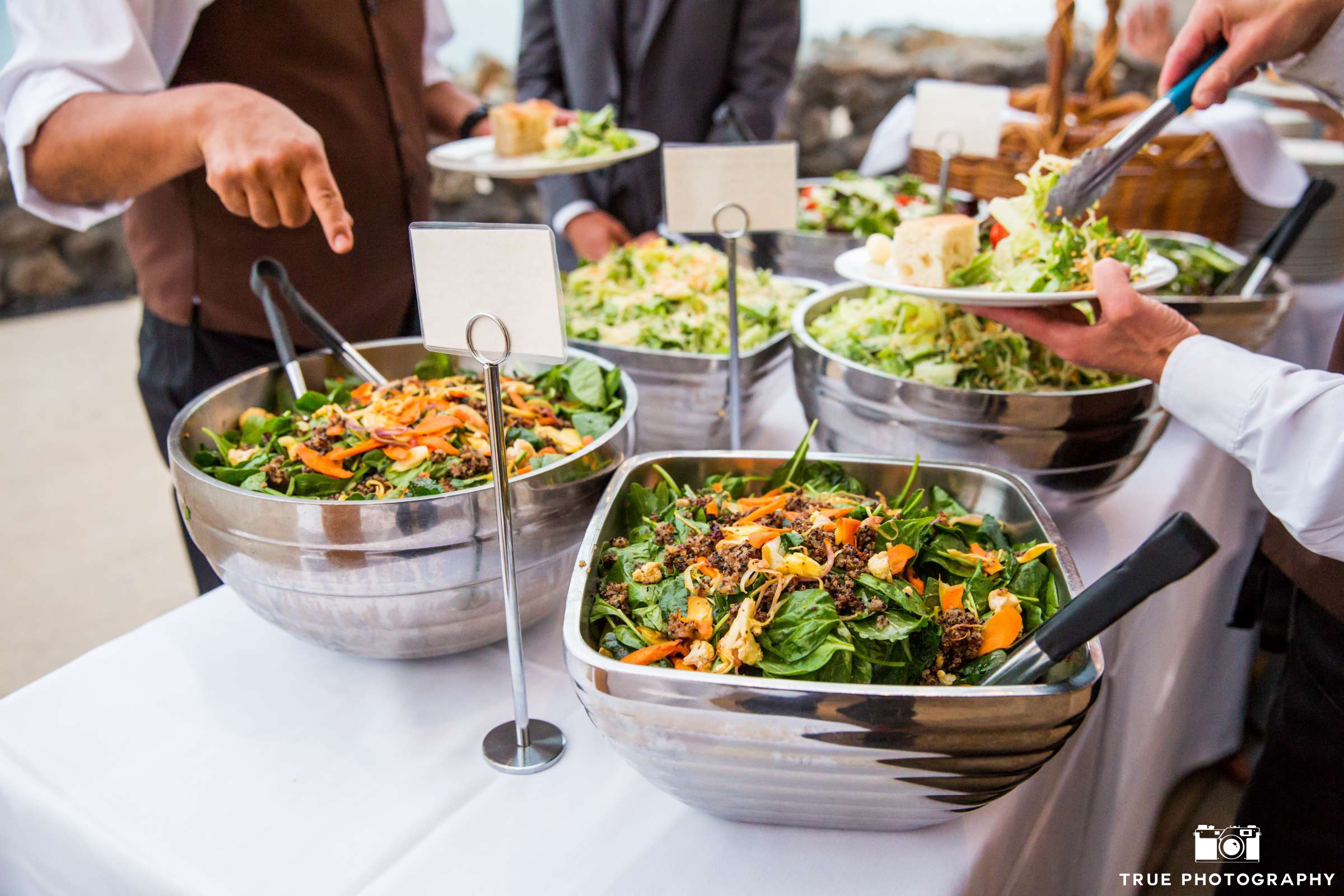 Various salads being served at an event