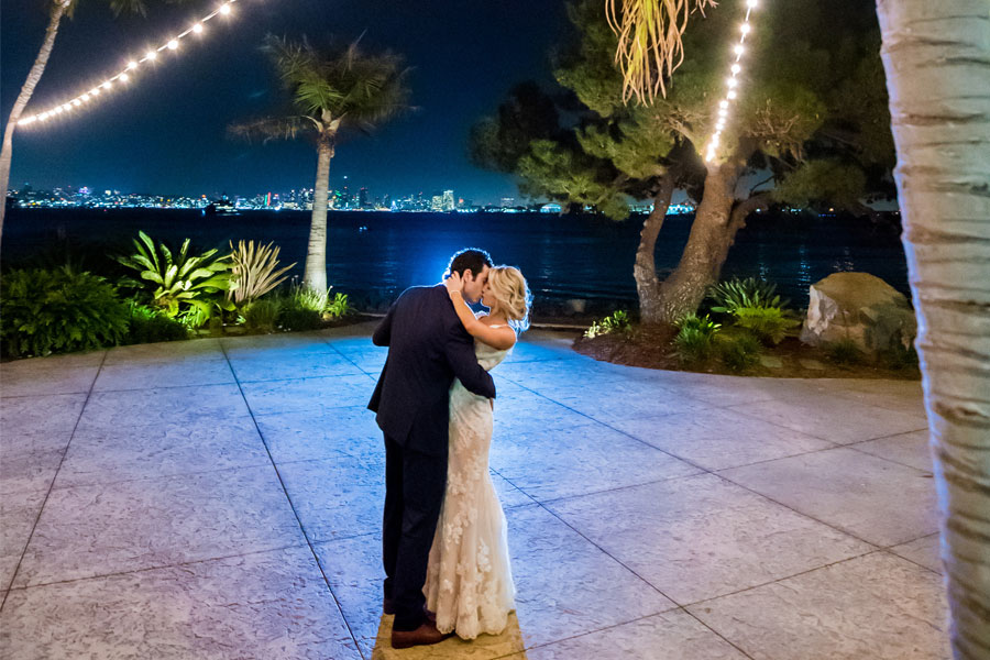 A dancing couple near the water