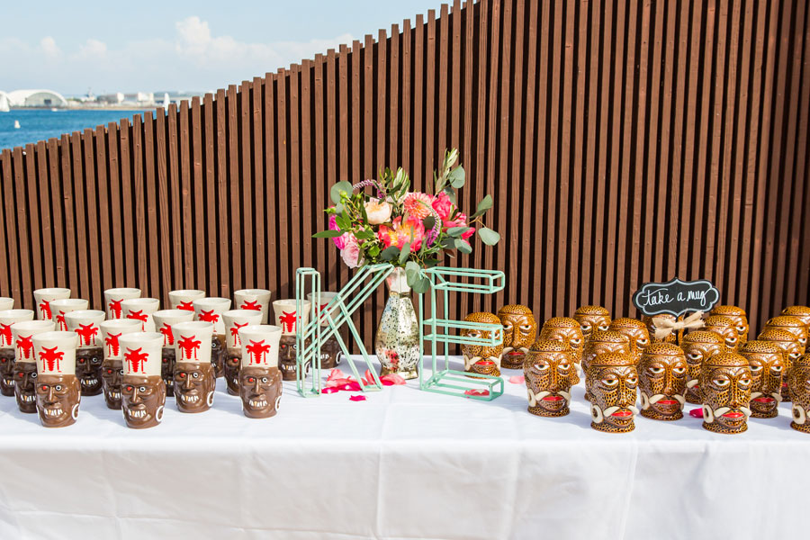 Tiki cups with a view of the water